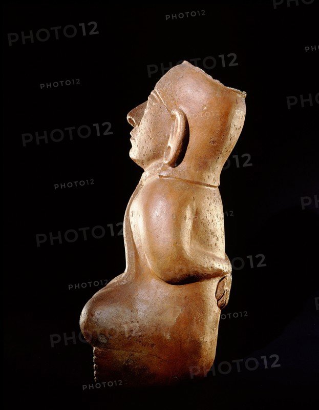 Mochica vessel in the form of a seated prisoner with his hands bound behind his back