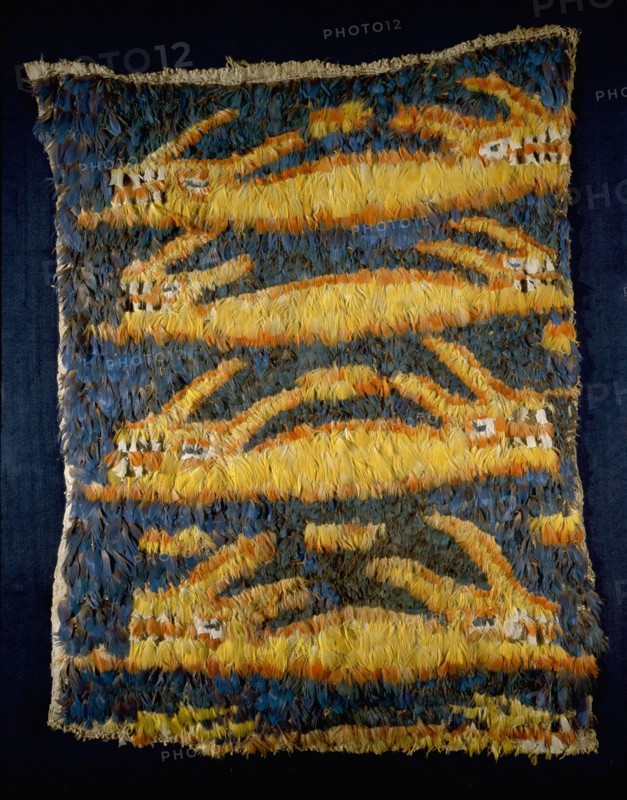 Featherwork tabbard with dragon design
