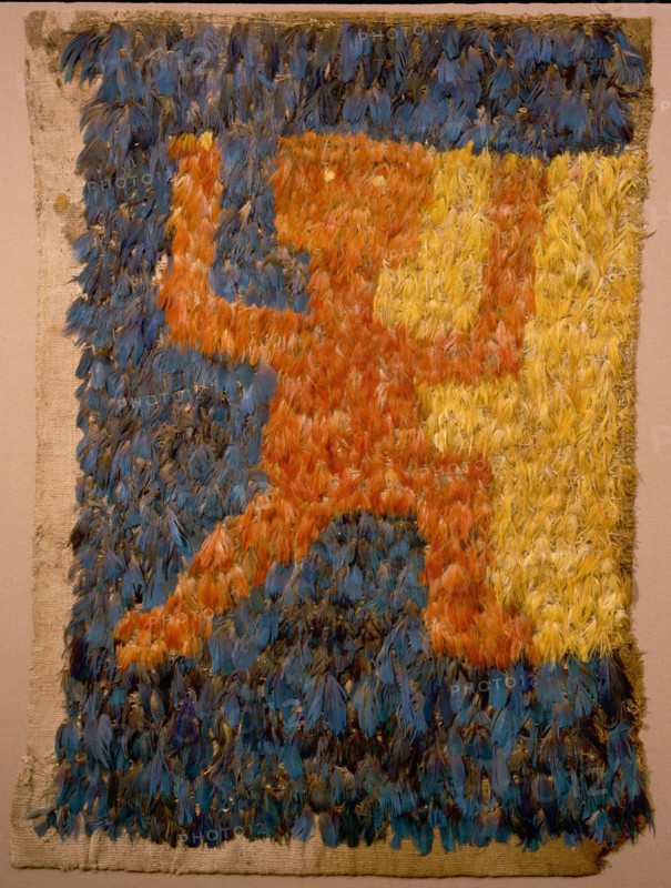 Featherwork tabbard with rampant monkey motif