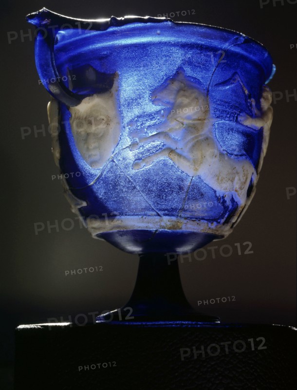 Rare Roman blue glass cameo carved skyphos depicting a scene from a Greek chariot race