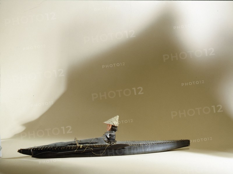 Model of an Aleut hunter in his kayak