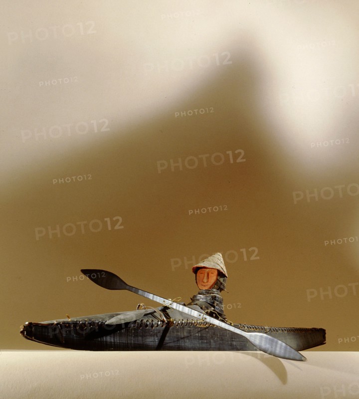 Model of an Aleut hunter in his kayak