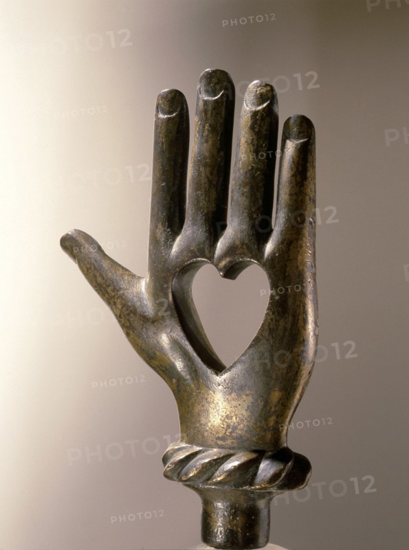 A finial of a staff used in the Cult of the Sacred Heart