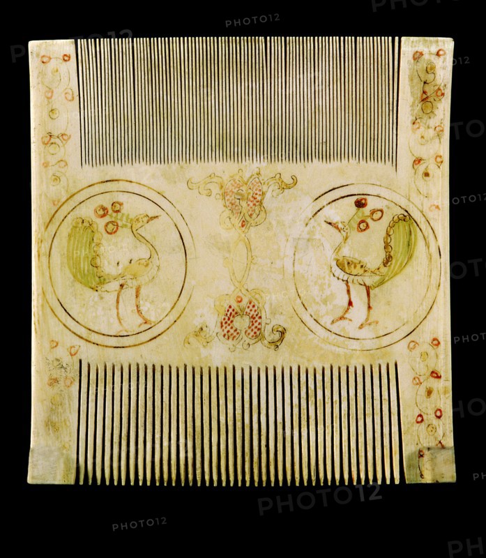 An ivory comb with painted decoration which was made by Sicilian Muslims for Christian patrons