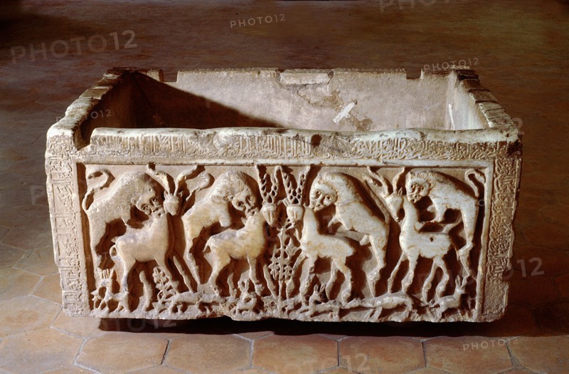 A marble ablution tank, known as The Alhambra Basin, with carved design of lions and gazelles