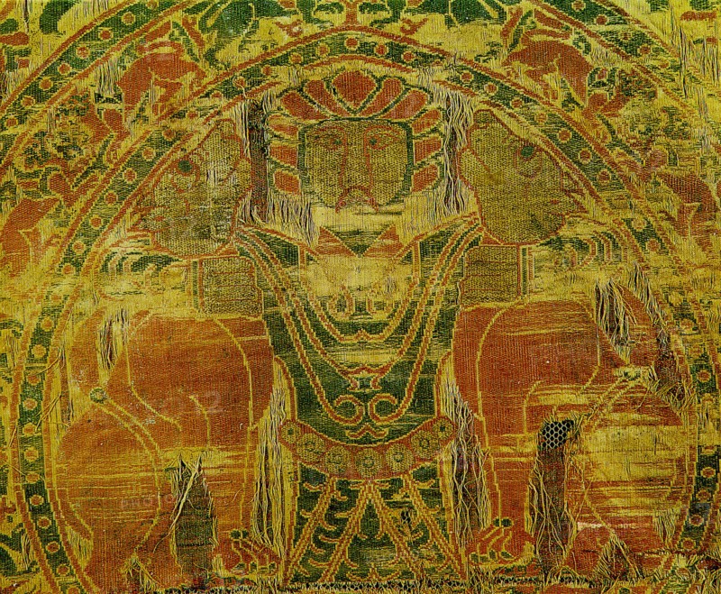 Detail of the so called Gilgamesh motif on a silk weaving found in the tomb of Bishop Bernard Calvo of Vich