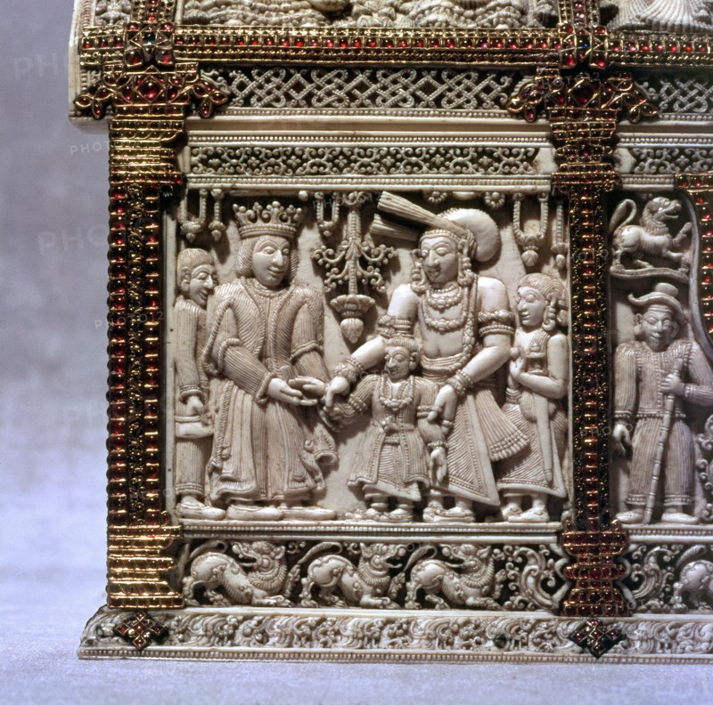 Detail of low relief carving on an ivory casket decorated with gold and rubies