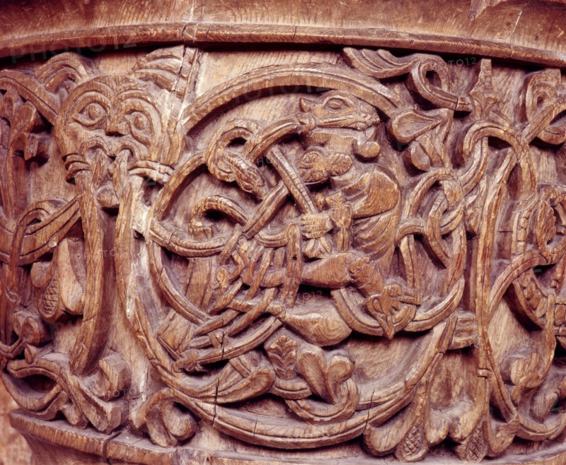 Carving on a baptismal font