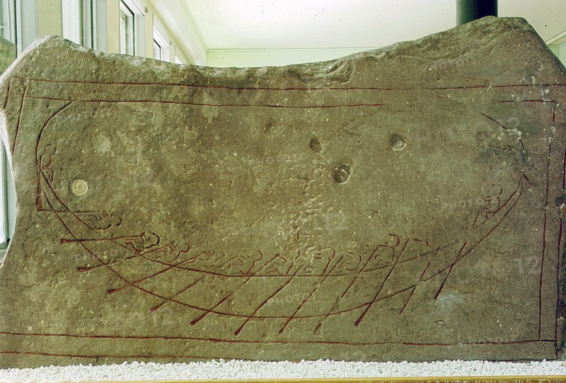 Limestone stele incised with design of a boat