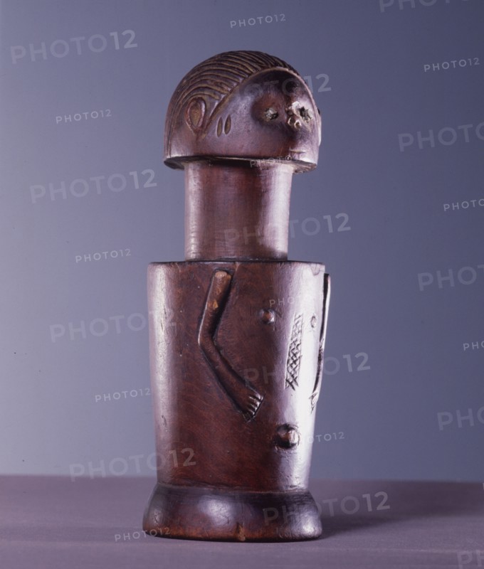 Among a number of cultures in coastal Tanzania, wooden figures of this cylindrical form, known as Mwana Hiti, were worn by girls undergoing initiation