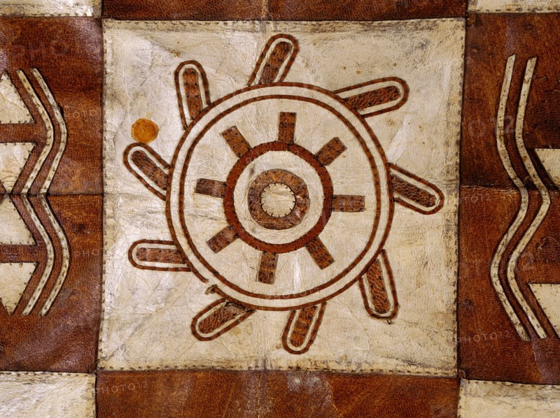 Detail of a rug made of animal skin squares