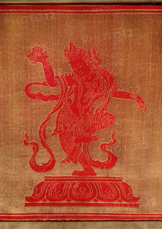 Sino Tibetan silk and gold brocade altar cloth depicting eight auspicious emblems interspersed by puja devis (offering goddesses) who offer gifts to the five Dhyani Buddhas, or Buddhas of meditation