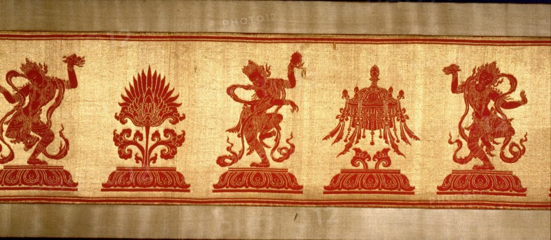 Sino Tibetan silk and gold brocade altar cloth depicting eight auspicious emblems interspersed by puja devis (offering goddesses) who offer gifts to the five Dhyani Buddhas, or Buddhas of meditation