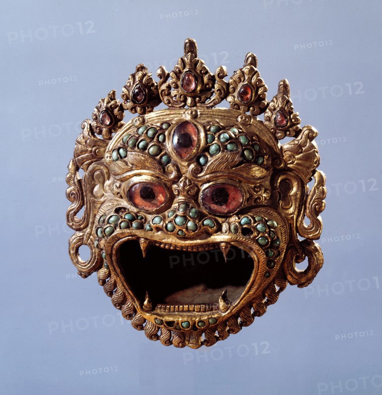 A holy water vessel in the form of a demonic face