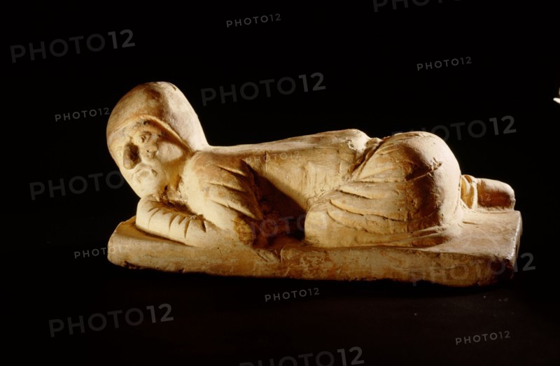 Tomb figure (miniature pillow) in the form of a kowtowing Persian trader