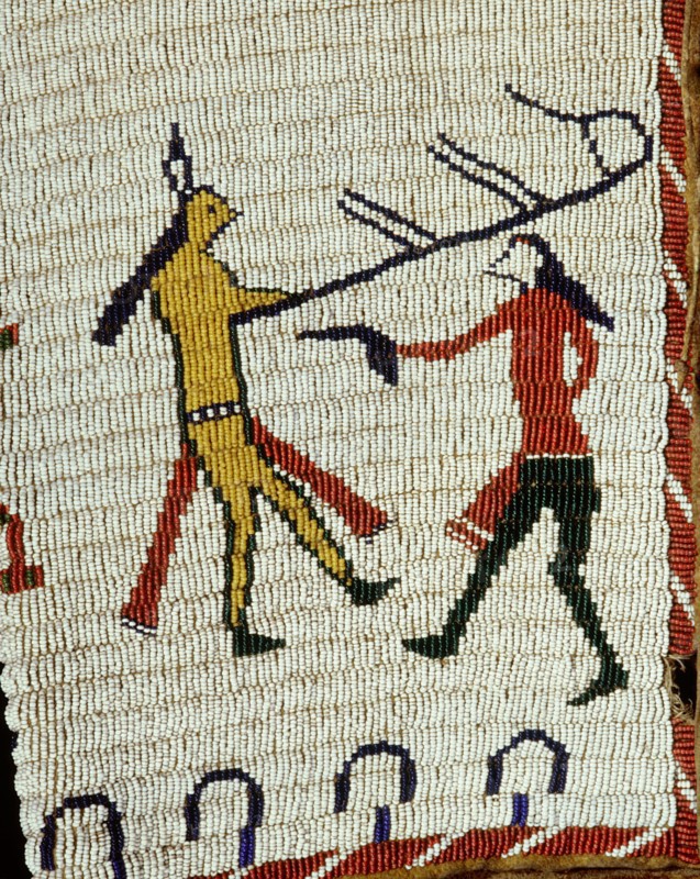 Beadwork decoration on a sleeveless jacket showing fighting between an Indian and a white man