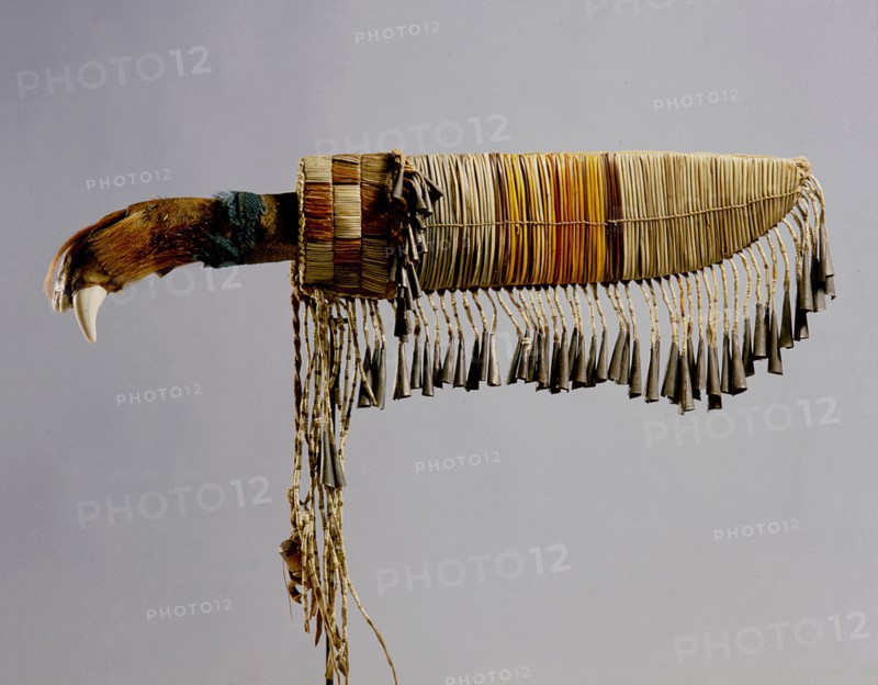 Knife with metal trade blade set into a hilt made from half a bears pow