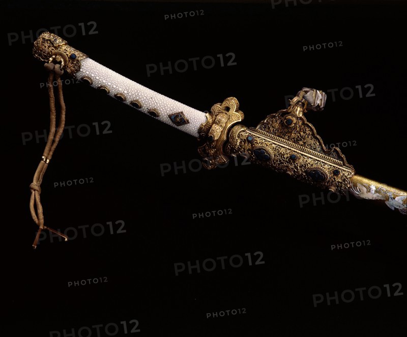 Detail of the scabbard of the courtsword Kazadachi made in deliberate imitation of a sword of the Heian era with elaborate enamel and giltwork