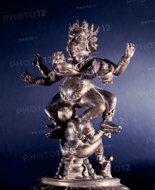 The exotic form of Ganapati with the primary head in the form of the elephant headed Ganesha supported by a monkey goddess enganged in fellatio
