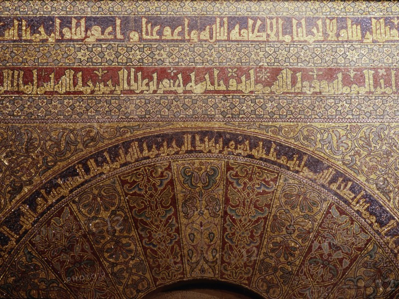 Detail of calligraphy and decorative mosaics above the door of the Iman in the Great Mosque of Cordoba