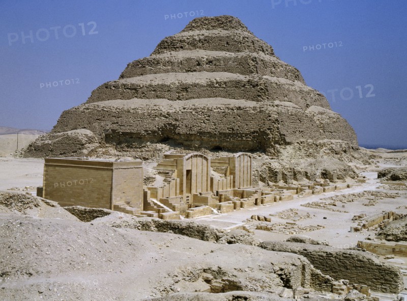 The step pyramid of Zoser at Saqqara and the enclosure with stone replicas of kiosks and chapels for the royal jubilee festivals ( heb-sed )