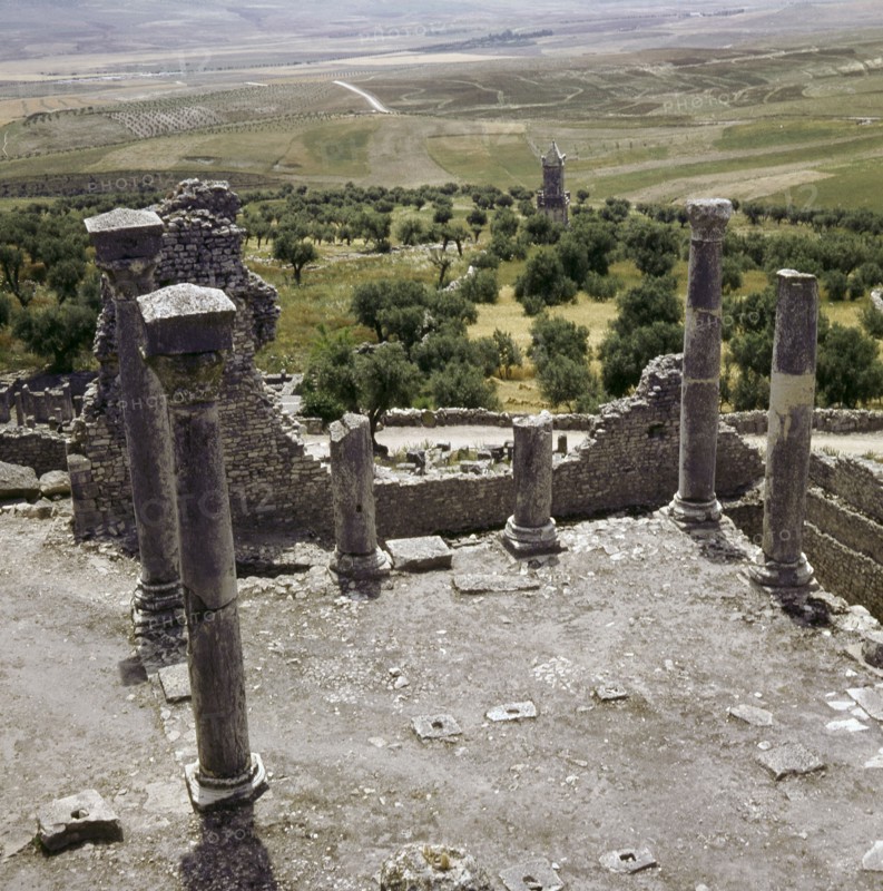 A Numidian Berber tomb built by Punic craftsmen seen from the ruins of the Roman city of Dougga