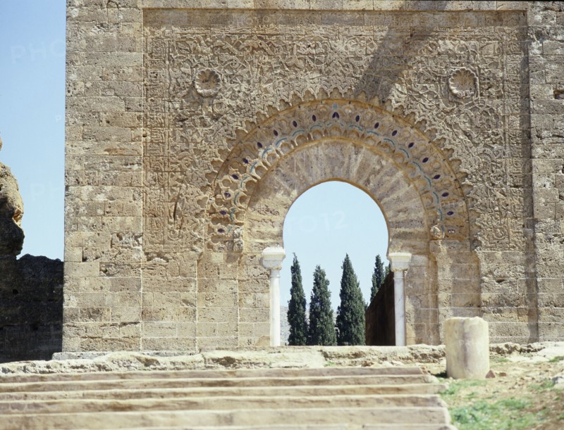The gateway into the courtyard of the ruined mosque of al-Mansura is set in the base of the minaret
