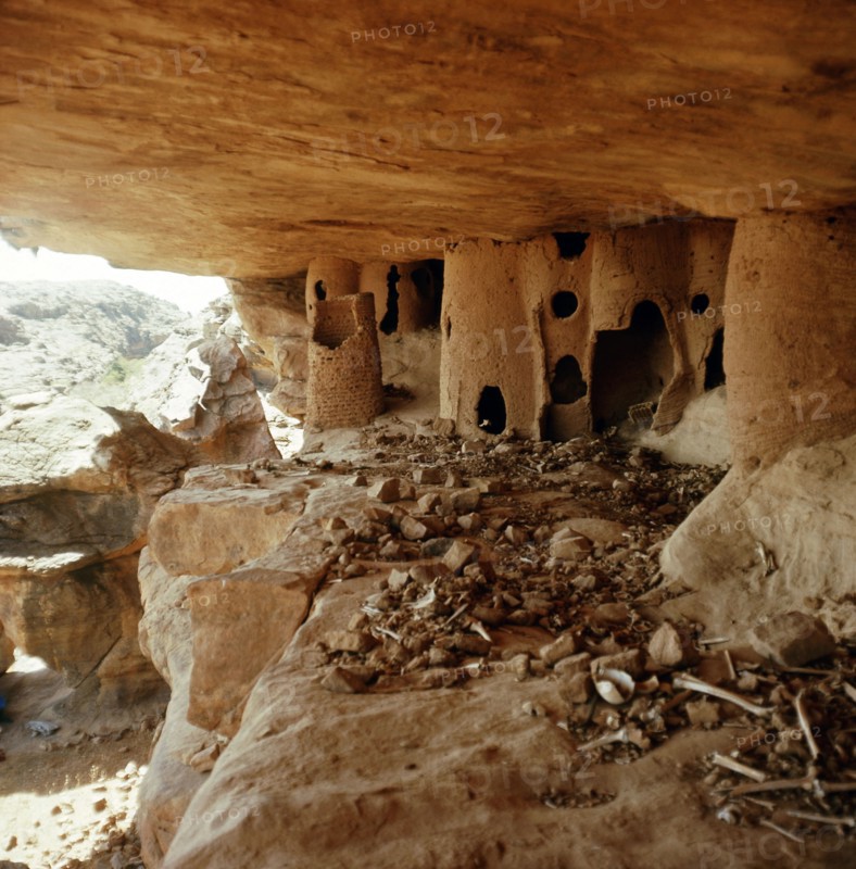 Mud tombs inside burial caves used by the Tellem in the sheer face of the Bandiagara cliffs near Sanga