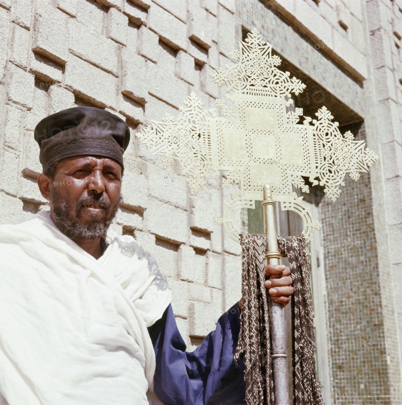 Monk with processional cross at the Cathedral of Our Lady of Sion, Axum