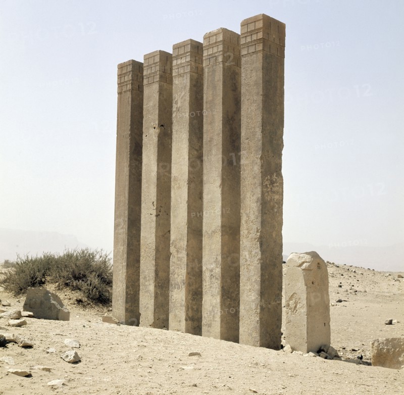 Five pillars still standing on the site of the Baran Temple, near the ancient city of Marib