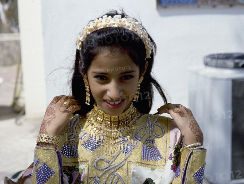 Geometric and floral decorative henna patterns were applied to adorn the hands and feet of young women on occasions such as weddings