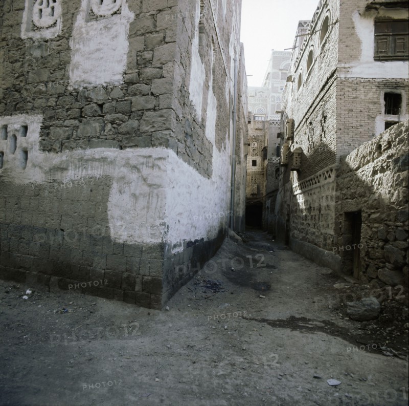 A narrow street in the town of Shibam