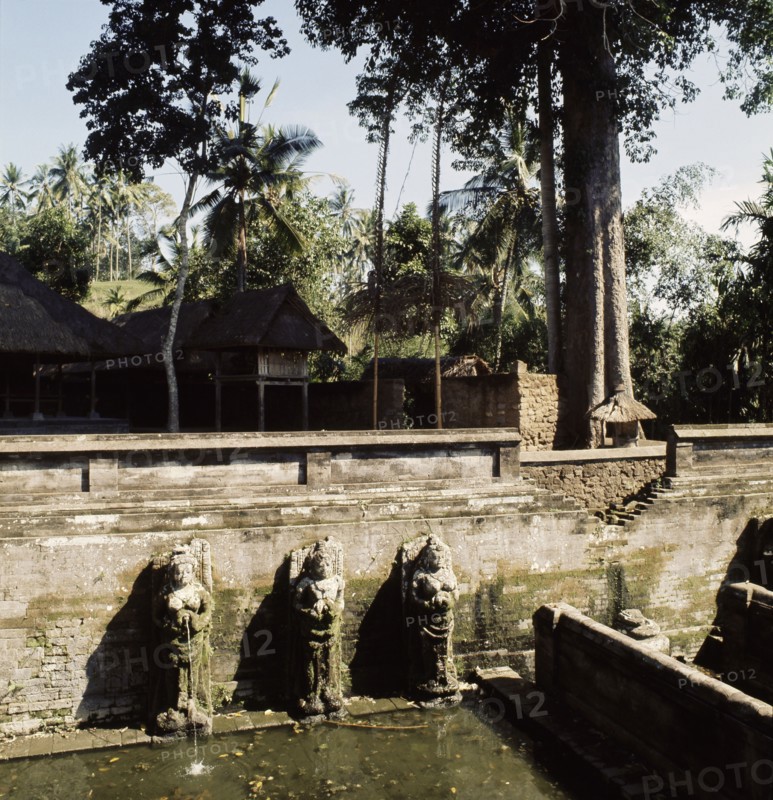 Heavenly nymphs spout water at the sacred baths of the Goa Gajah, Elephant Cave
