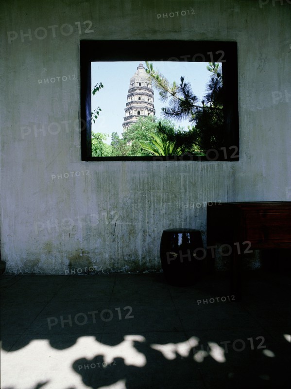 The pagoda of Yunyam temple, Hu Qui (Tiger) Hill, Suzhou, seen through the window of a covered corridor of Xiaowu House