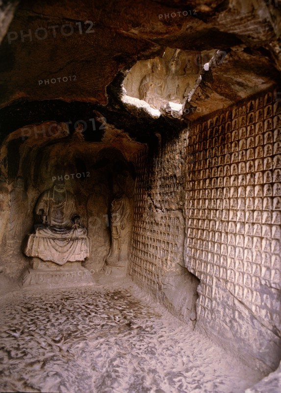 The Longmen cave-temple complex which extends for about 1000m along the Yi River