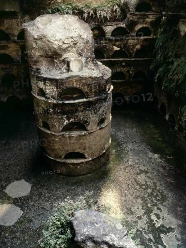 A columbarium tomb, its walls lined with niches for urns containing the ashes of the dead