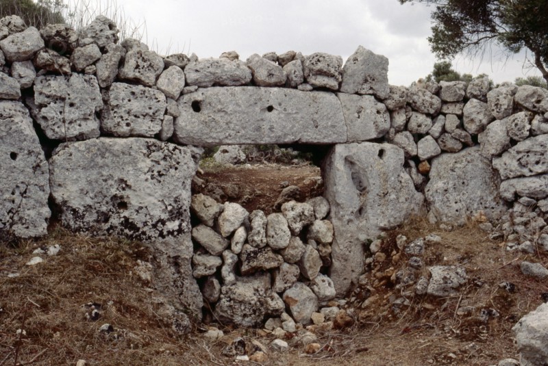 Monumental megalithic gateway set in the great wall at the fortified megalithic site of Son Catlar   Spain