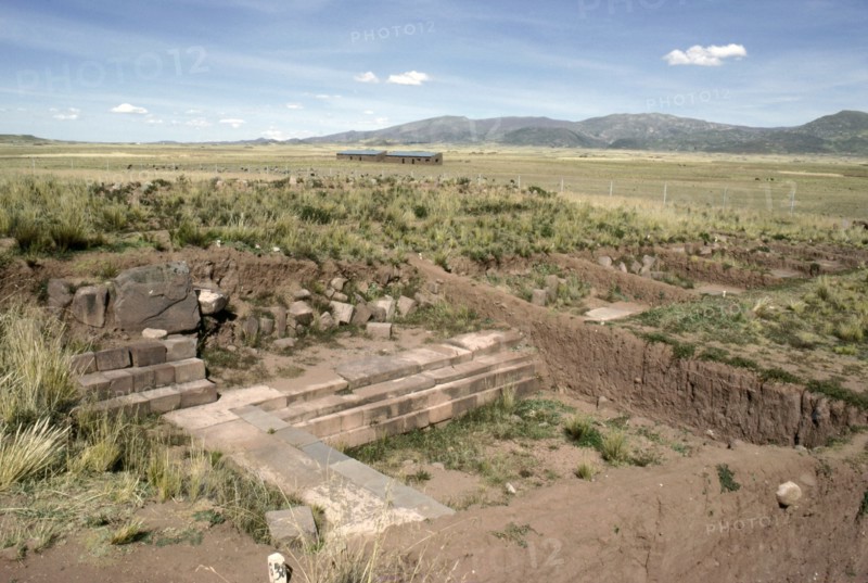 Temple architecture emerging from the soil at the Puma punku sector of Tiahuanaco (Tiwanaku)