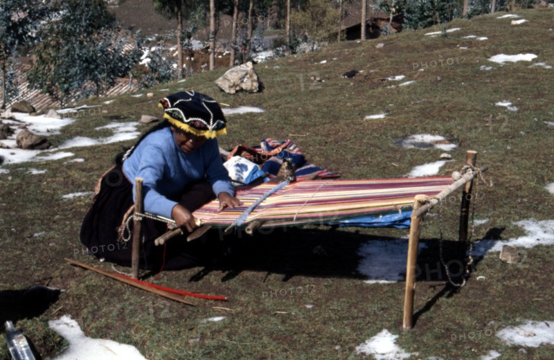 Quechua 'Inca' woman weaving on a horizontal single-heddle loom