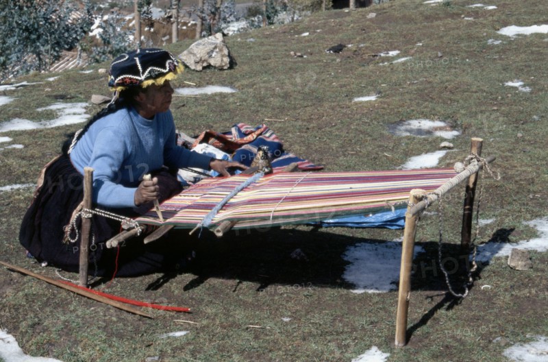 Quechua 'Inca' woman weaving on a horizontal single-heddle loom