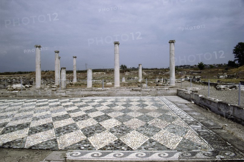View across a black and white diamond-shaped pebble mosaic floor at Pella, the Macedonian capital, and birthplace of Alexander the Great