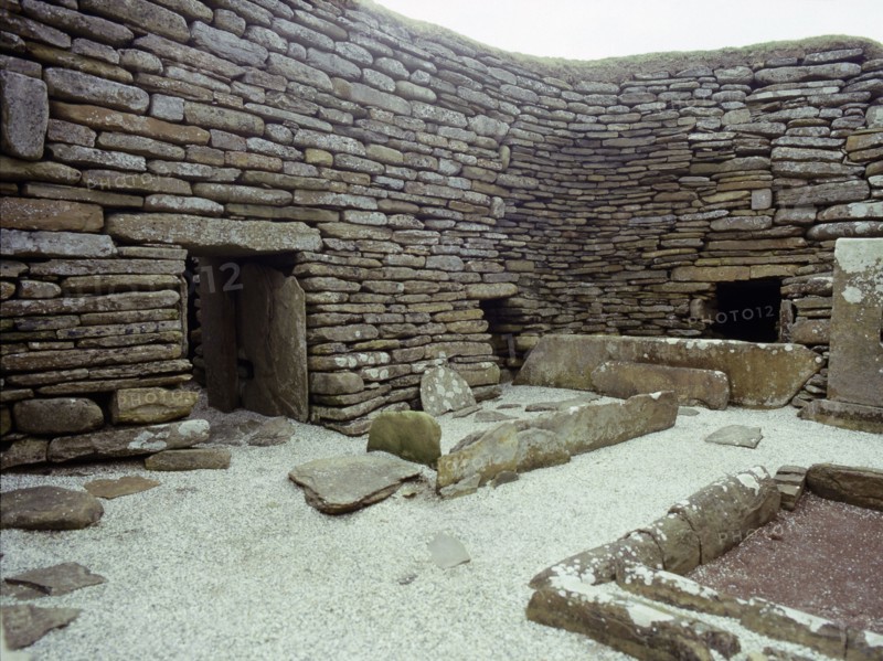 View of the interior of House 1, through the door