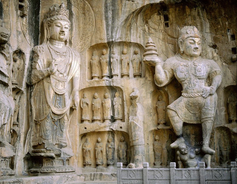 The guardian kings of Buddhism carved on the north wall of the Fengxian temple at the Longmen cave-temple complex