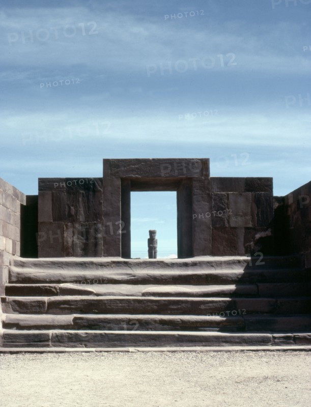 View across the "Semi-subterranean temple" to the monolithic doorway to the Kalasasaya enclosure, Tiahuanaco