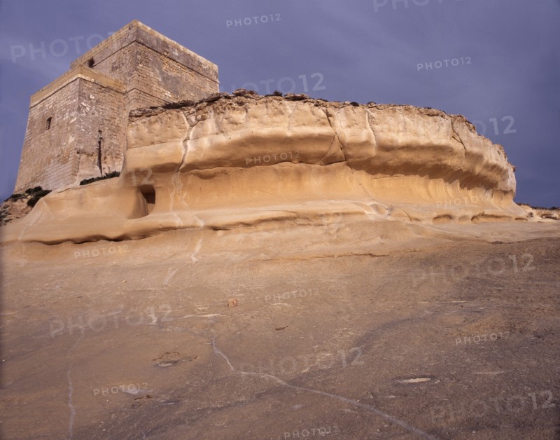 Watch tower at Xlendi and limestone formations