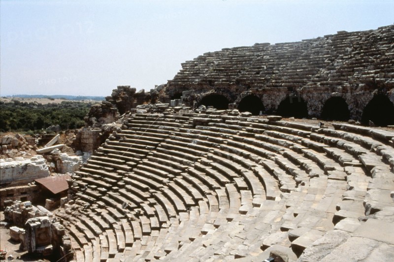 View of the upper rows of seats and arches of the supporting wall of the theatre at Side