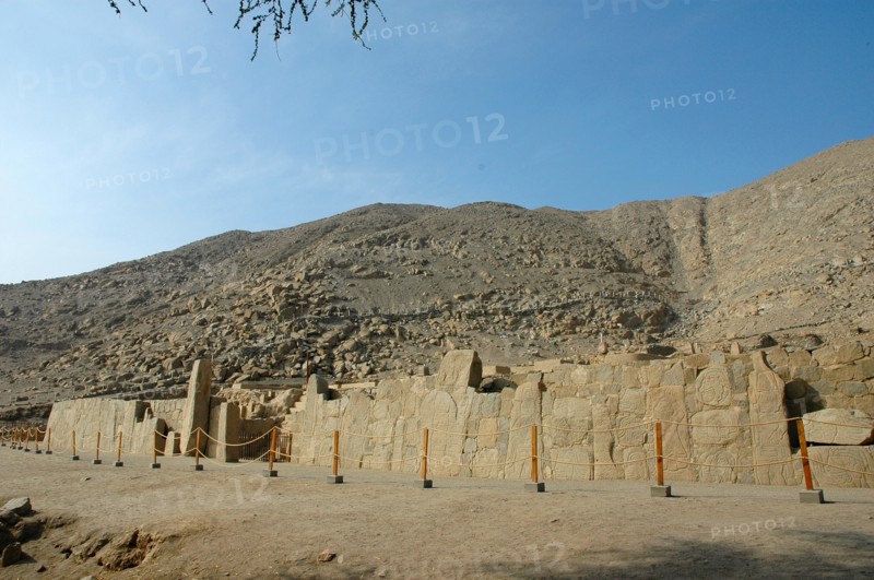 View of the site of Cerro Sechin and the front wall of the reconstructed temple which was discovered in 1937
