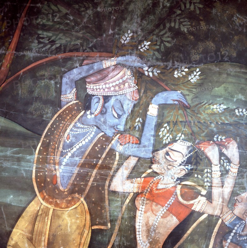 A detail of a wall hanging with scenes from the legend of Krishna