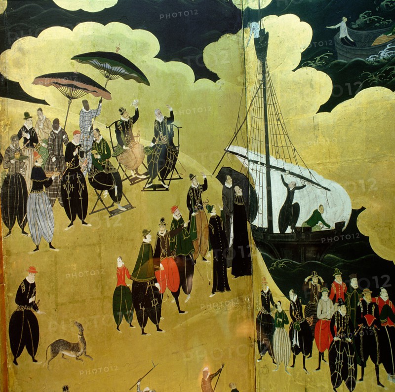 Detail from a folding namban jin or 'southern barbarian' screen depicting a harbour scene recording the arrival of exotic looking Portuguese merchants in Japan