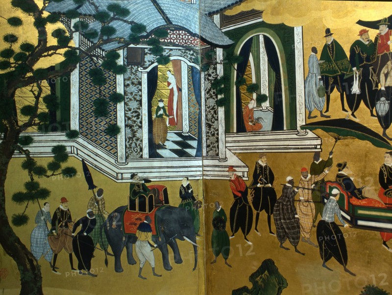 Detail from a folding namban jin or 'southern barbarian' screen depicting a harbour scene recording the arrival of exotic looking Portuguese merchants in Japan